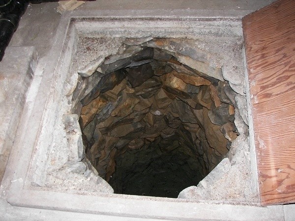Be careful next time you pull off floors.
These homeowners found a hole that went down a cave. No explanation left what it was for or more importantly, why?