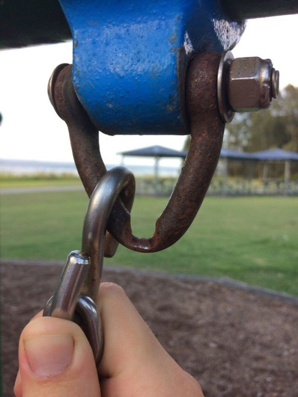 Chain link that is slowly wearing down the fastener it is attached to.