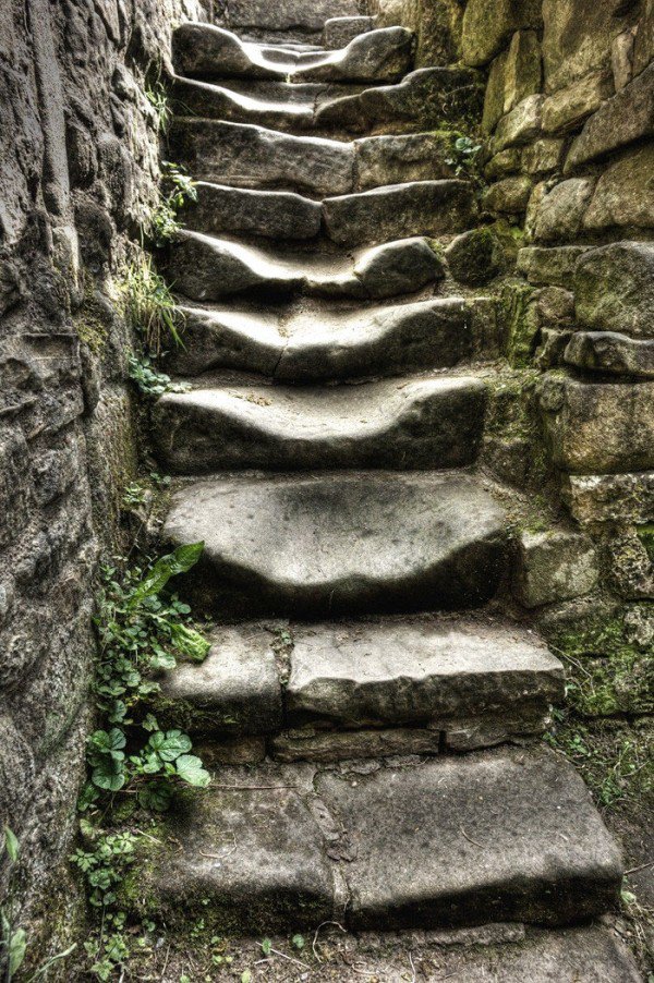 Steps that have started to droop from being outside for so much time.