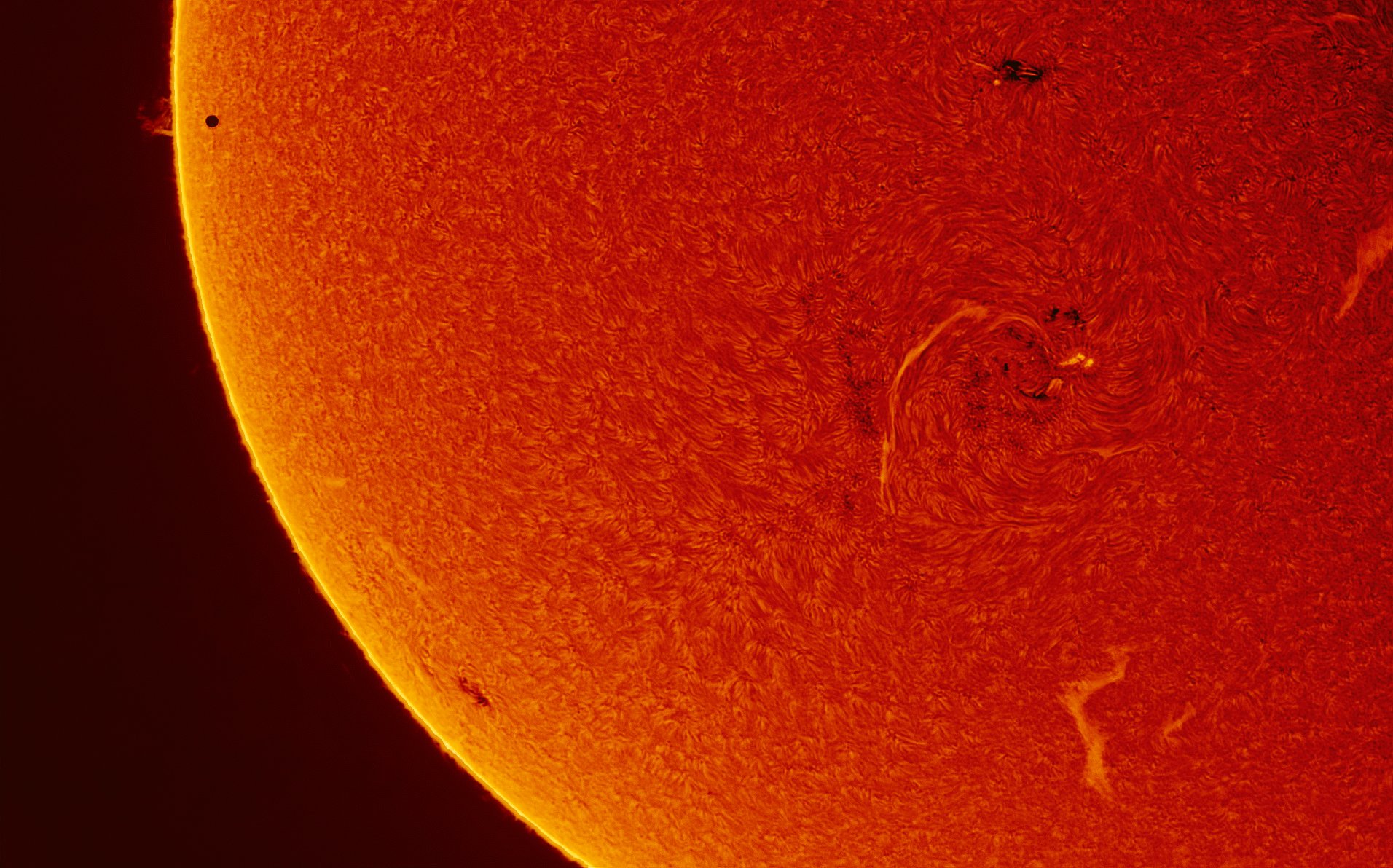 Black dot upper left is Mercury passing infront of the Sun