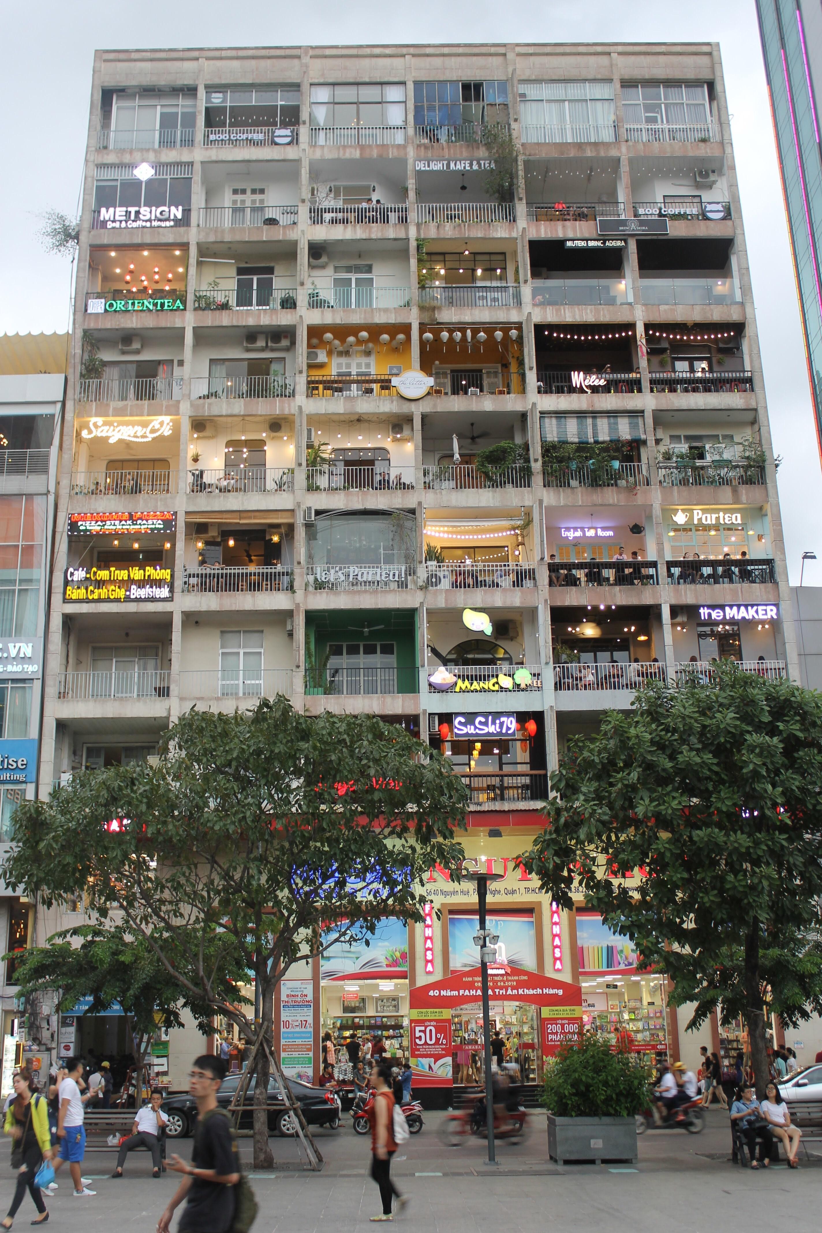 This Vietnamese building is a hub. Each balcony is a different cafe or restaurant