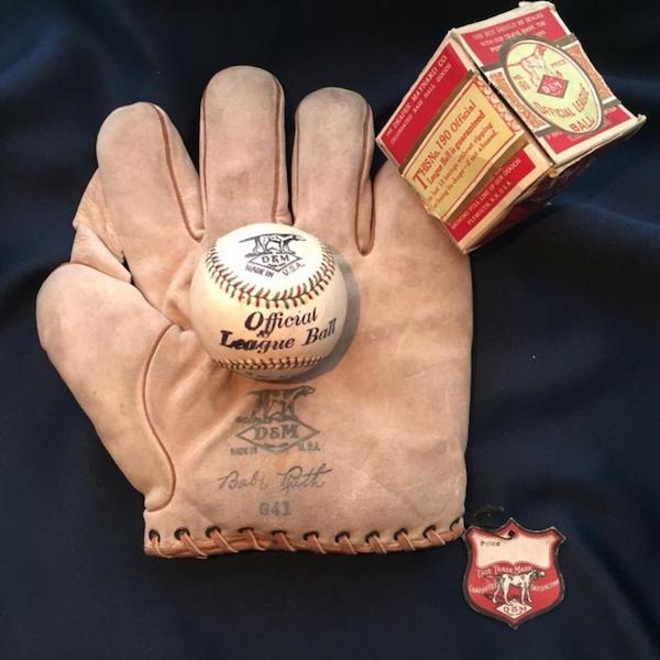 The 75-year-old owner of an apartment building in Trondheim, Norway was cleaning out his storage unit when he happened upon a dusty old chest which had remained closed for possibly as long as a century. Inside was an assortment of pristine, high-end sporting goods, including extremely valuable and rare baseball gloves, baseballs, and an inflatable chest protector, all circa 1920. 

The artifacts were manufactured by Draper and Maynard, a top athletic supply company based in New Hampshire from about the 1880s to the 1930s. At its peak, D&M boasted that 80 percent of big leaguers were using its baseball gloves.

The Ruth D&M glove fetched $11,600 at auction, the highest price of anything in the find.