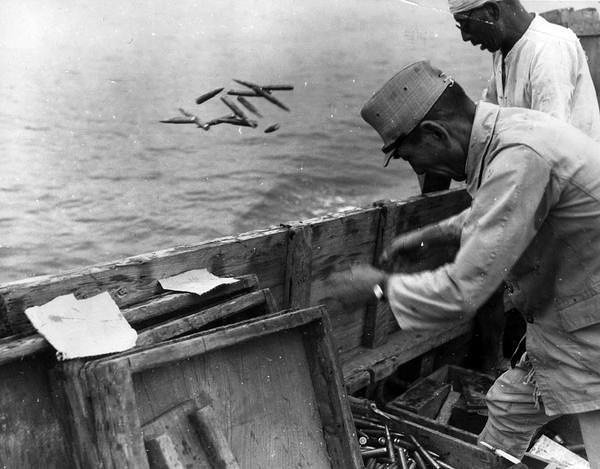 Japanese ammunition being dumped into the sea on September 21, 1945. During the U.S. occupation, almost all of the Japanese war industry and existing armament was dismantled