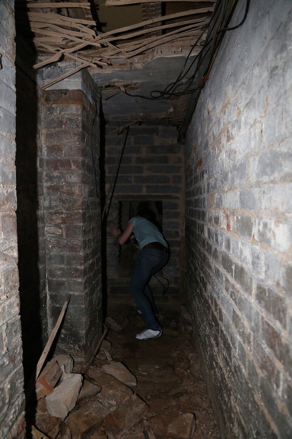 Checking out other nooks and crannies under the house's secret compartment.