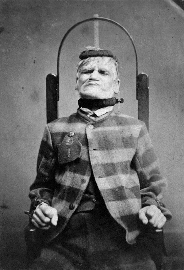 A patient sits in a restraint chair at the West Riding Lunatic Asylum in Wakefield, England in 1869.