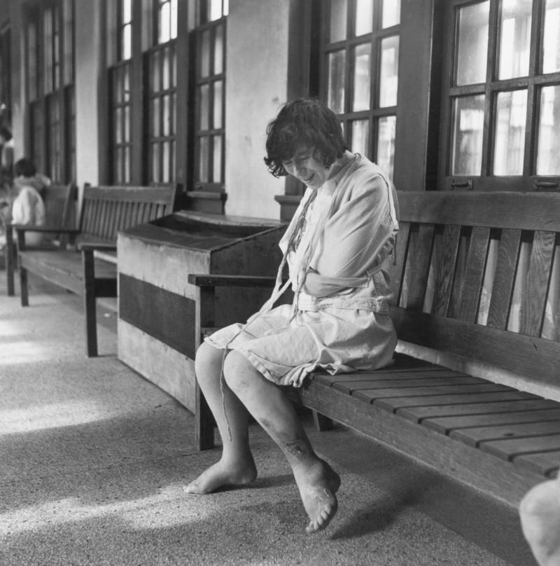 A patient sits inside Ohio’s Cleveland State Mental Hospital in 1946.