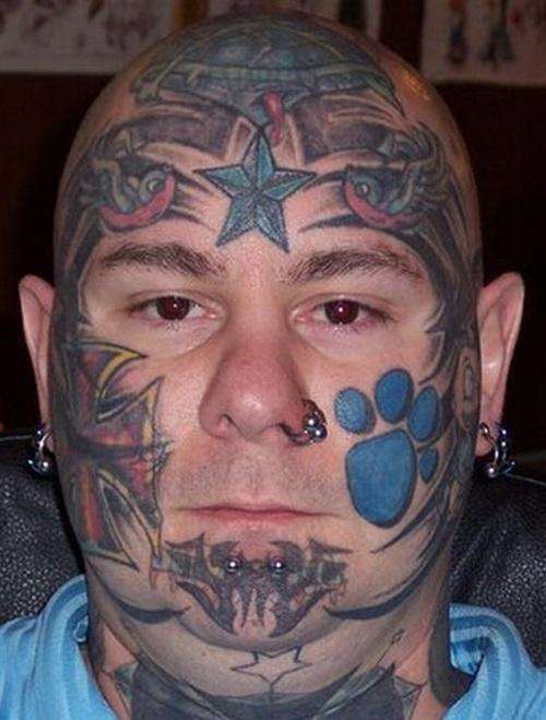 paw print face tattoo