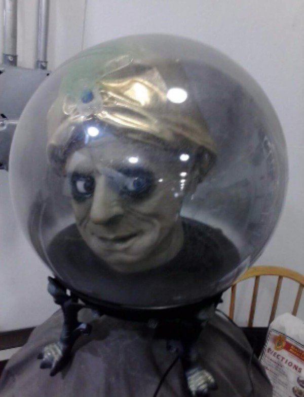 Magic wizard head in crystal ball for sale in thrift shop