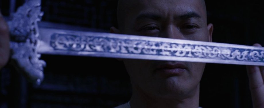 The Green Destiny, Crouching Tiger, Hidden Dragon (2000)
Kuo Chang-hsi, sword maker, via his assistant: “The sword blade was fully handmade of 12 different kinds of metal. Through pattern welding, Mr. Kuo forged the blade over 1,000 layers and made the carving look like the twining pattern of numerous green dragons hidden in the 90cm sword blade. Mr. Kuo also carved 23 dragons on one side of the sword, which symbolized the 23-year emperor’s position of Sun Quan (A.D. 182- 252). It took Mr. Kuo three months to make Green Destiny sword.
“There is a specific term for the Chinese pattern welding technique — ‘folded pattern steel’ by literal translation. The process might be similar to that of making Damascus steel.”