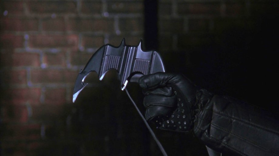 The batarang, Batman (1989)
Terry Ackland-Snow, art director: “We did a rough design sketch of what was required, and then it got handed over to the special effects supervisor, John Evans, who made all the gadgets. We were working on it all together at the same time, giving Tim Burton exactly what he wanted Batman to have. [The batarang] was based on trying to fit the symbol of Batman — the idea was to have everything Batmobile-looking, the wings, that sort of thing. All the gadgets echoed each other.”
John Evans, special effects supervisor: “I think we made about a dozen. We made some with fiberglass and some with polished aluminum. Anton [Furst]’s team had done all the designs, so he gave us the designs, and we took it from there. It was a simple thing to do. We just had to get the balance right so it could fly through the air.”