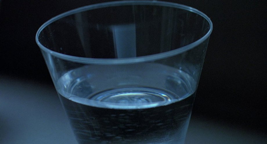 The cup of water, Jurassic Park (1993)
Michael Lantieri, special effects designer (in the Jurassic Park feature Making Prehistory): “I was at work and Steven [Spielberg] calls into the office. He goes, ‘I’m in the car, I’m playing Earth, Wind & Fire, and my mirror is shaking. That’s what we need to do. I want to shake the mirror and I want to do something with the water.’ The mirror shaking was really very easy — put a little vibrating motor in it that shook it. The water was a another story. It was very difficult thing to do. You couldn’t do it. I had everyone working on it. Finally, messing around with a guitar one night, I set a glass and started playing notes on a guitar and got to a right frequency, a right note, and it did exactly what I wanted it to do.”