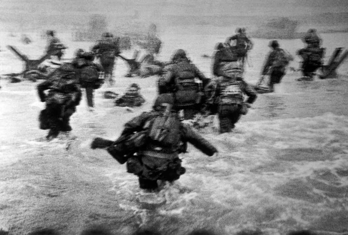 Omaha Beach. June 6th, 1944. The first wave of American troops lands at dawn