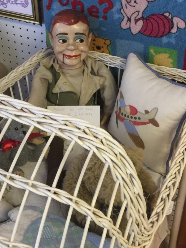 Creepy ventriloquist doll at a thrift shop.