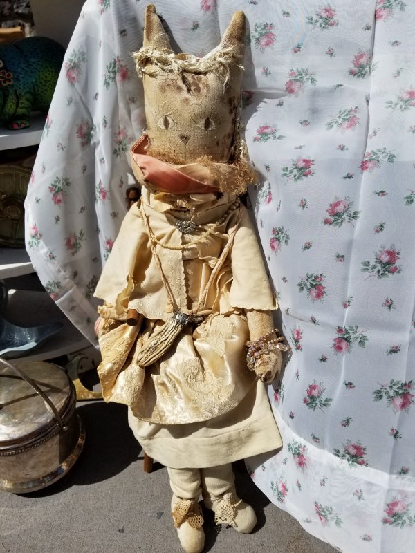 Really scary doll at at thrift shop