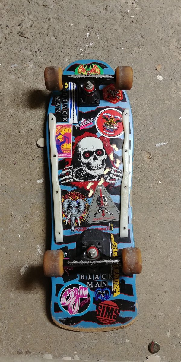 Thrift shop find of rad skateboard with cool artwork