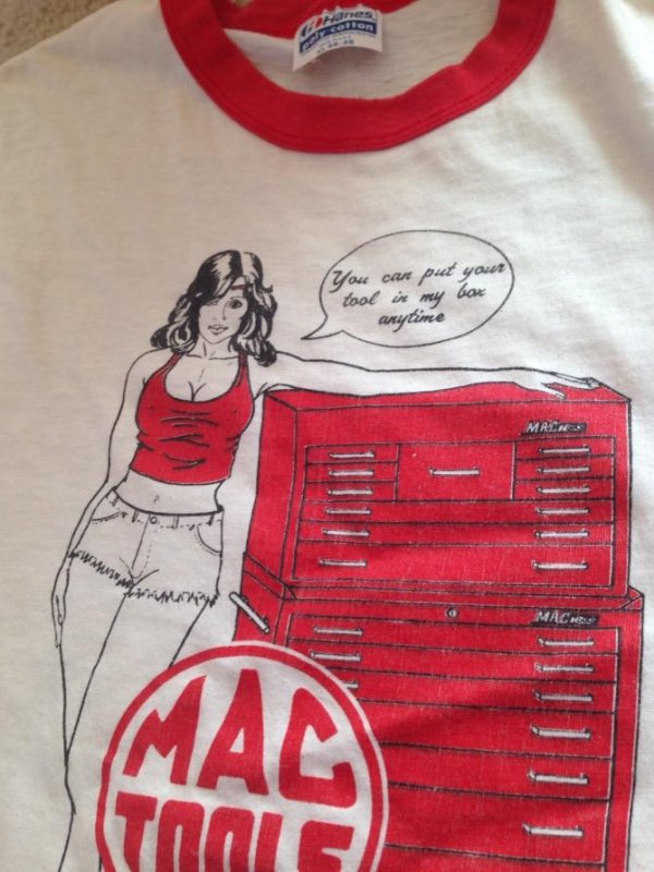 Shirt for Mac tools for sale at a thrift shop that has hot girl in 80's attire and says You Can Put Your Tool In My Box Anytime