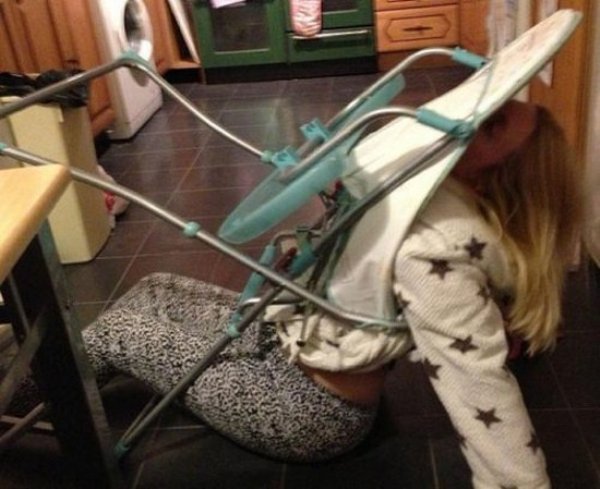 woman stuck in baby chair