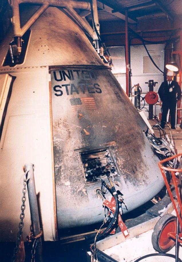 The Apollo 1 Tragedy:
the orbit with Virgil “Gus” Grissom, Edward White and Roger Chaffee on board. Tragically, however, the spacecraft was destroyed in a cabin fire during a launch pad test 50 years ago.
On January 27, 1967 Apollo 1 was sitting on the launch pad atop a Saturn 1B rocket at Cape Canaveral Air Force Station Launch Complex 34, the precursor to the Saturn V. It was set to perform a “plugs-out” test, during which both the launch vehicle and the spacecraft were not loaded with fuel and all pyrotechnic systems were disabled. The task was merely to prepare Apollo 1 for its launch on February 21, 1967 by running through various system procedures.
During the second run through the checklist, the fire started. The 100% oxygen atmosphere fed the electrical fire, the increasing pressure rupturing the capsule wall. Shrapnel injured ground crew, while smoke billowed out to smother them. Within 26 seconds, the horrified ground team heard garbled voices yelling, and saw flame sweeping across the camera. It took five full minutes for the ground crew to peel open all three hatches, trading off as heat and smoke forced them to retreat.