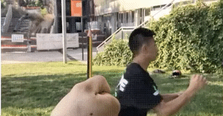 GIF of amazing jump kick over a pencil