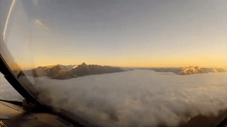 Awesome GIF of landing an airplane through the clouds