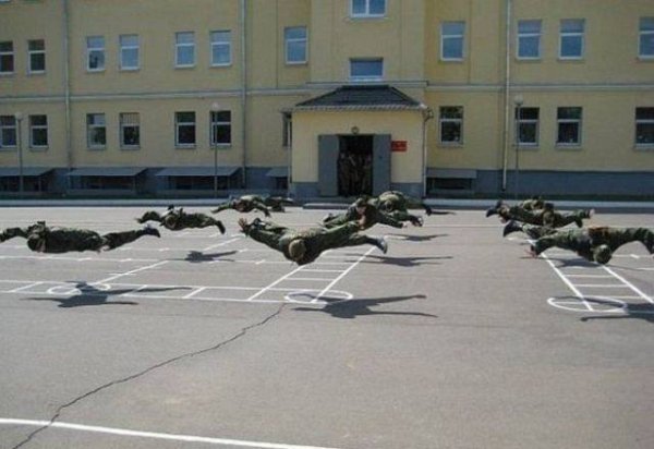 Military pushups right when they are all in the air.