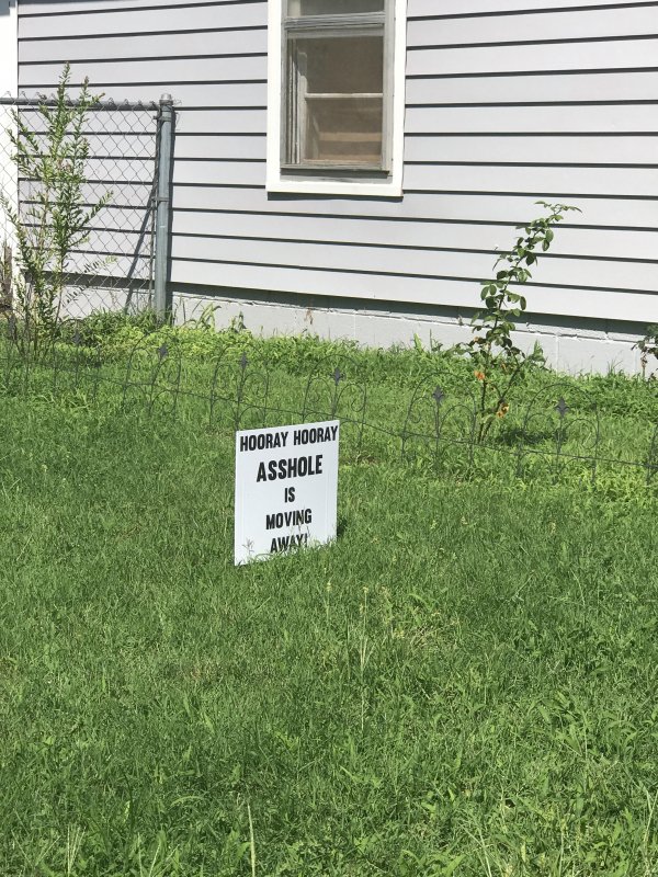 Sign celebrating that the neighbor is moving away.