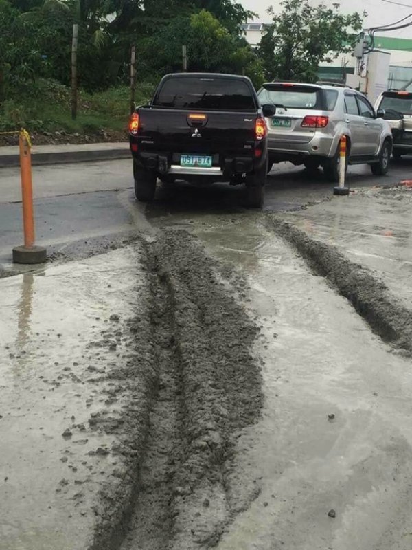 Pickup truck that took a short cut right over fresh cement and ruined it all for everyone