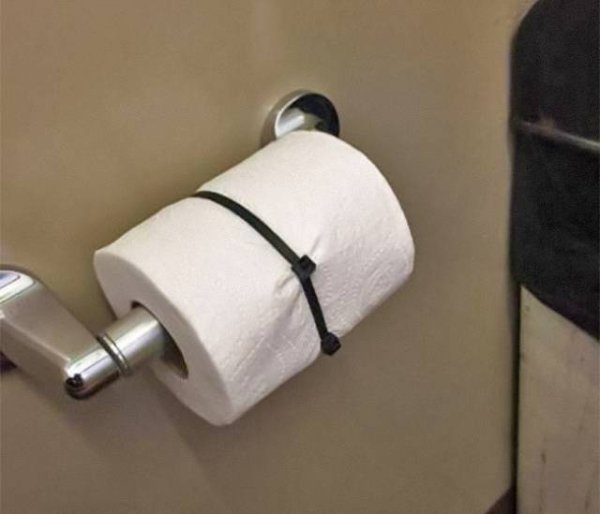 Toilet paper roll shut with a zip tie