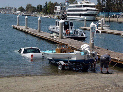 Pickup that went into the water the wrong way for releasing that boat.