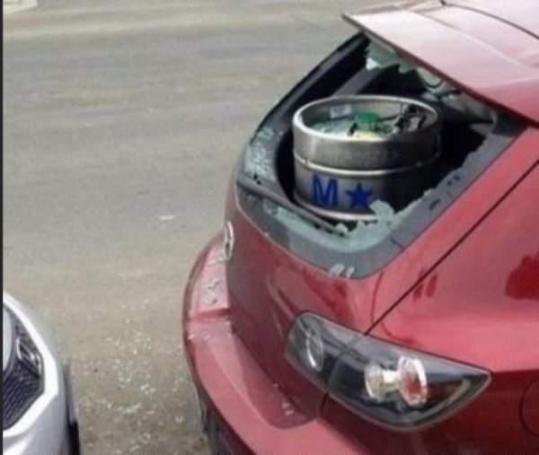 Rearview window that busted out when slammed on a keg that was placed in the trunk.