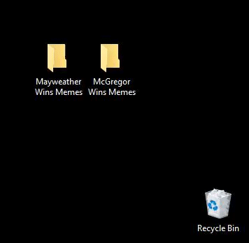 Brutal GIF meme of deleting all the McGregor Wins memes from your desktop now that he lost the fight.