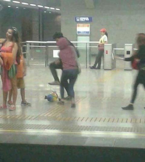 Airport picture of someone stomping on a minion