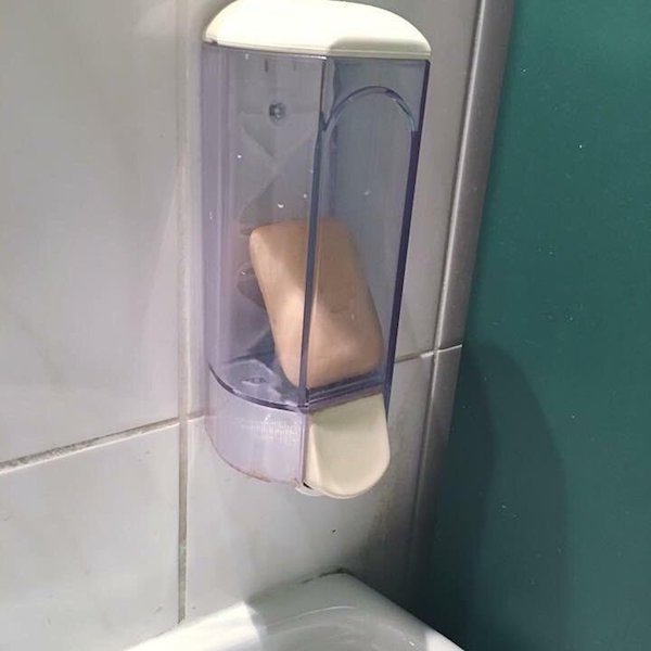 bar of soap in the liquid soap dispenser somewhere in Russia