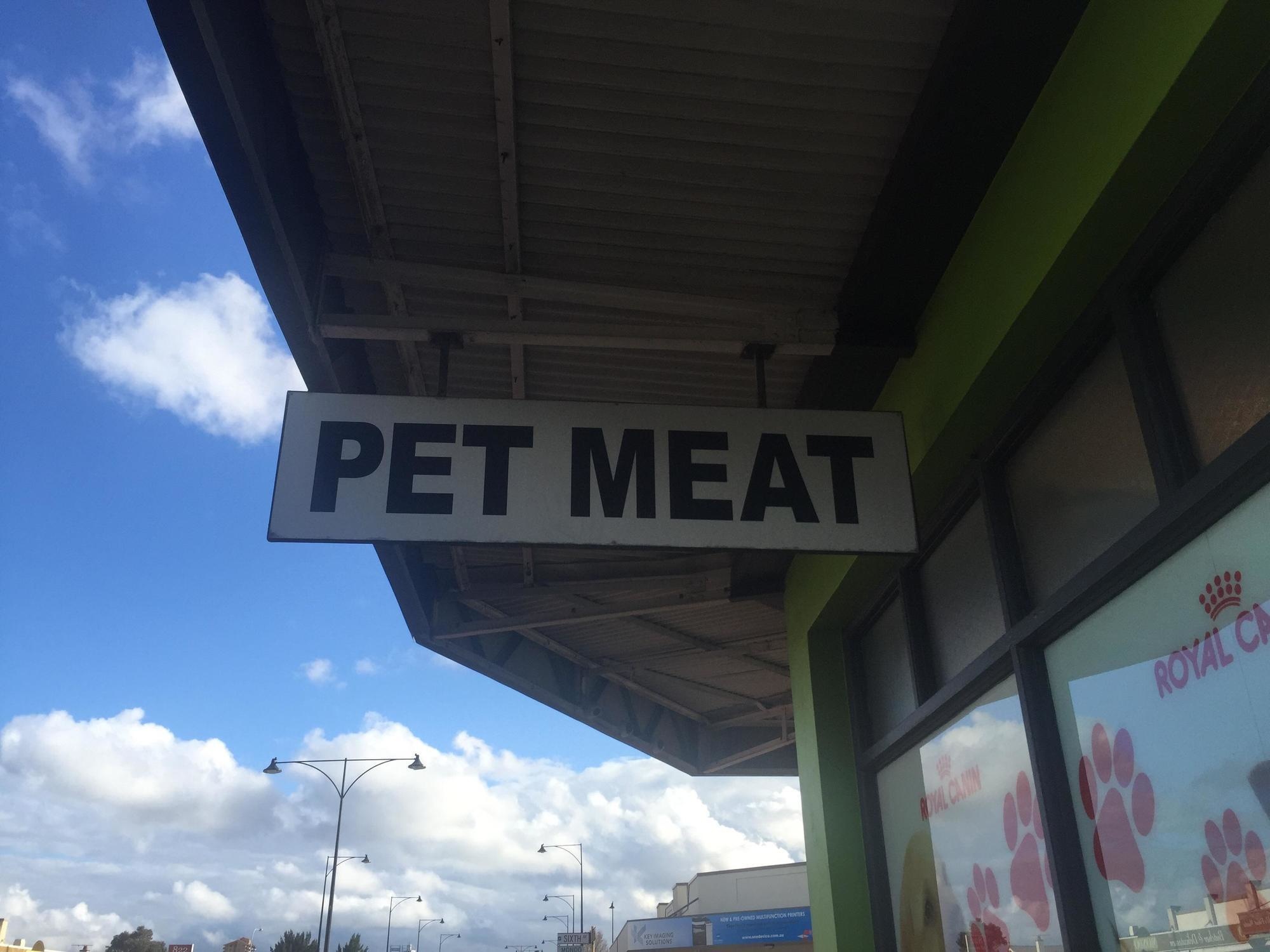 Sign that reads PET MEAT