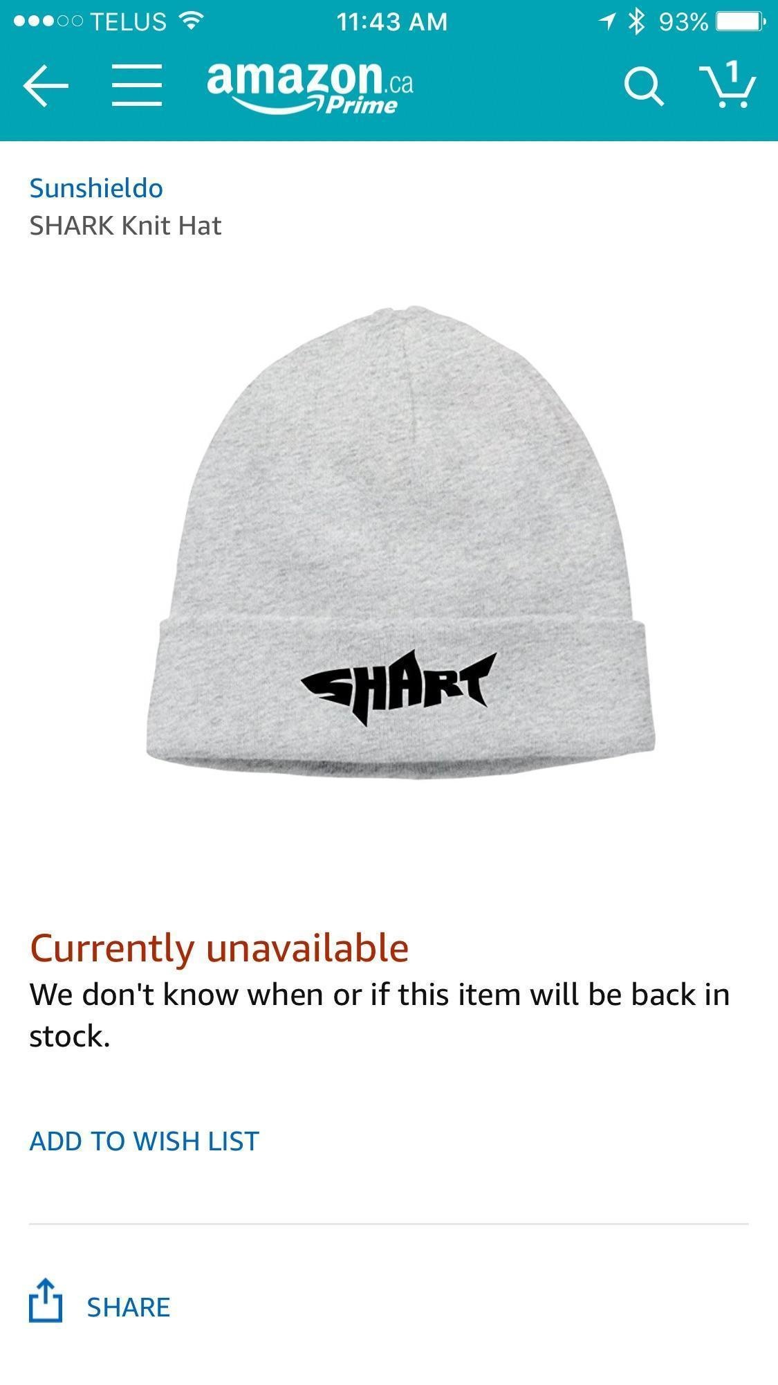 Shark hat that reads SHART