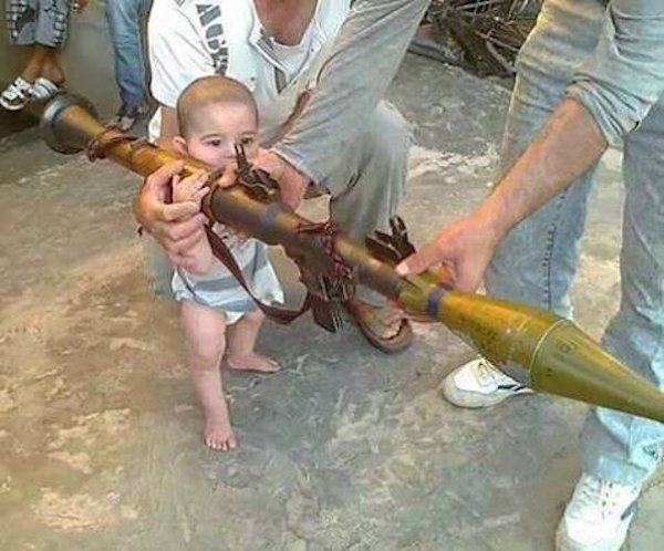 Russian baby playing with RPG launcher