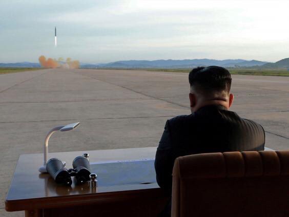 Kim Jong-un watching the rocket take off