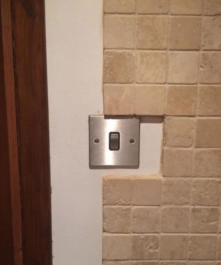 Fake bricks on the wall no mounted of light switch