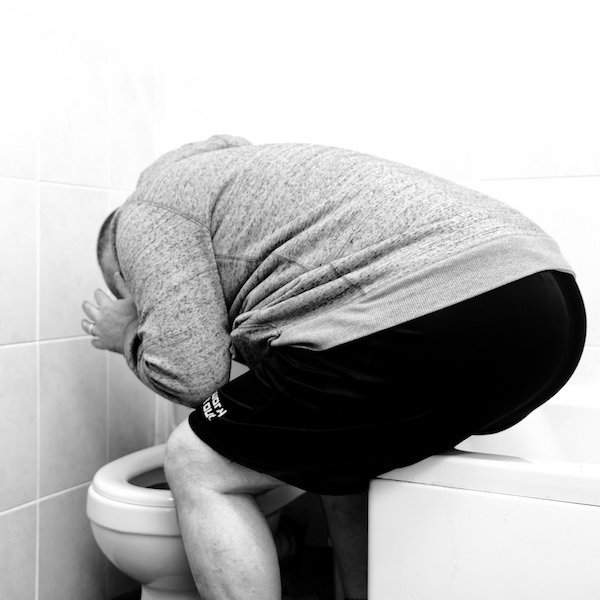 Dude ran to the bathroom, yelled “I gotta shit!” then pulled his pants down, sat his ass on the toilet, and puked on the floor in front of him. Realizing his mistake, he stood up, faced the toilet to puke, and shat on the floor behind him.