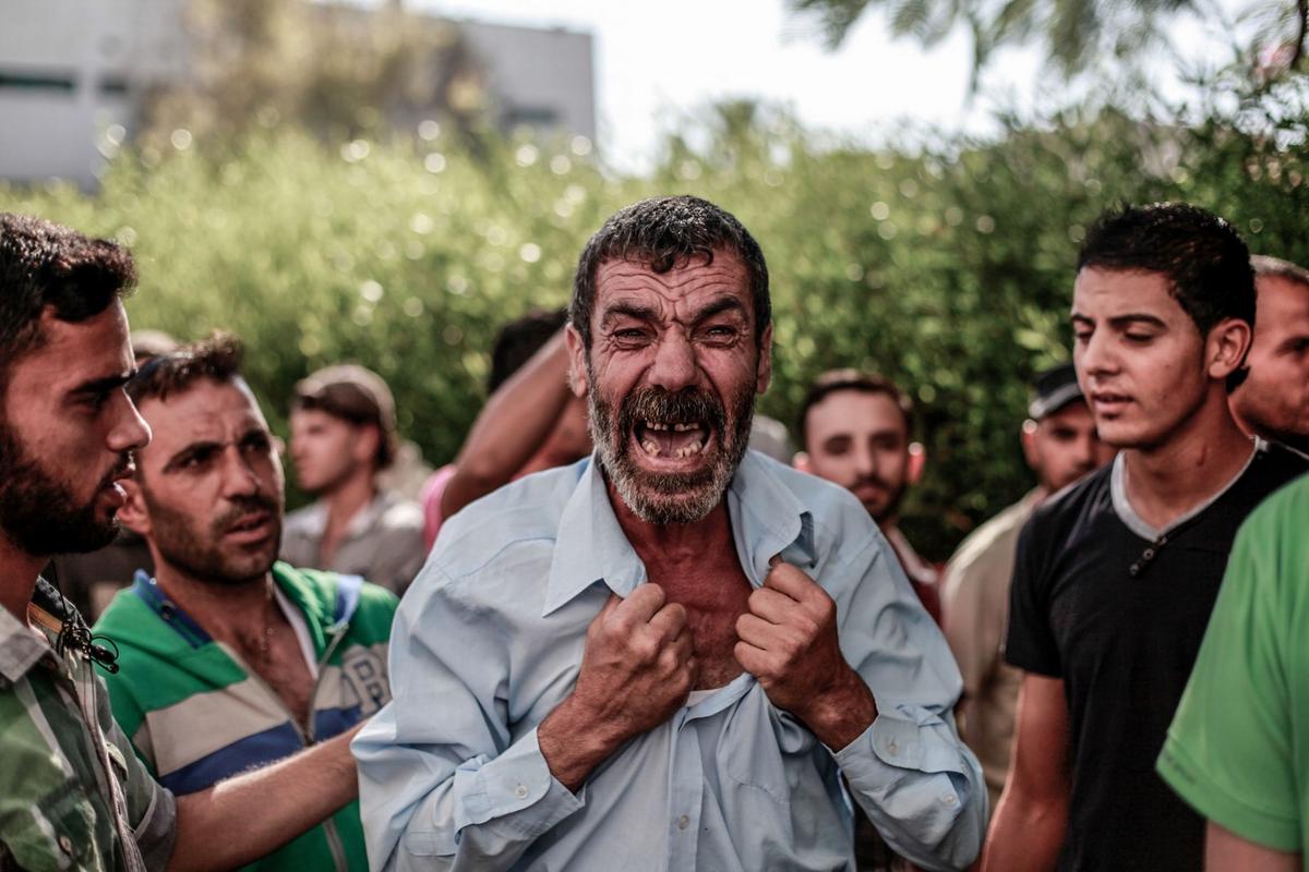 The father of one of the four boys, all from the Bakr family, killed during Israeli shelling