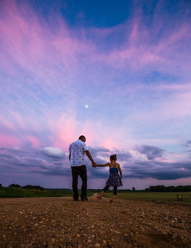 Dancing with daughter at sunset