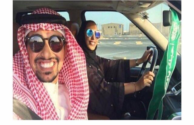 Saudi man shares a photo of him teaching his wife how to drive