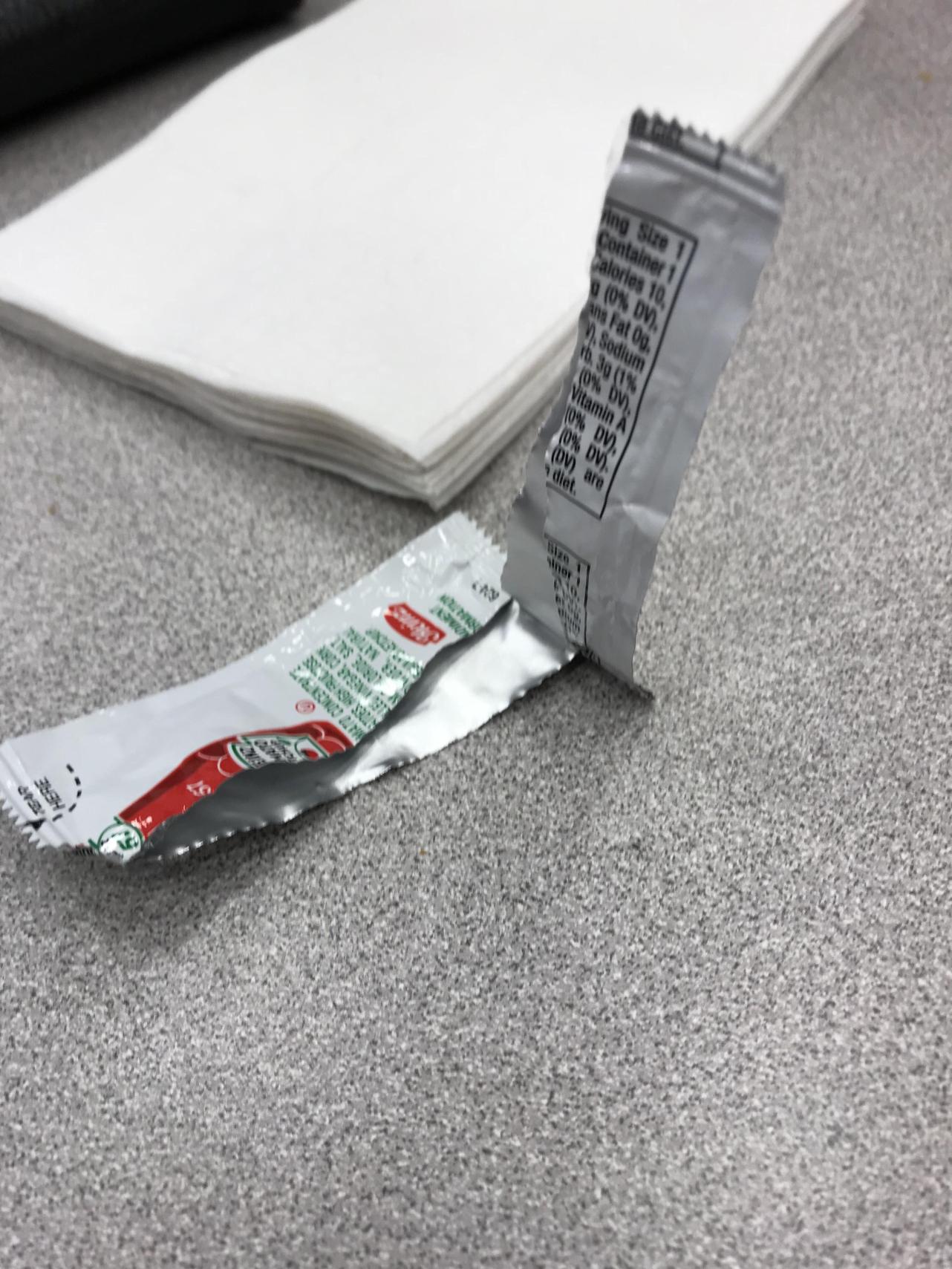 Ketchup packet that is totally empty