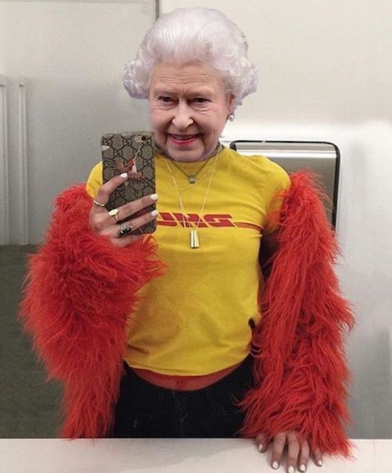 Queen of England taking selfie wearing t-shirt and some furry outfit