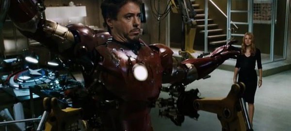 Iron Man (2008)Marvel movies are notorious for their easter eggs, this one snuck past a lot of people though. Captain America’s (unfinished) shield can be seen on a table behind Tony.