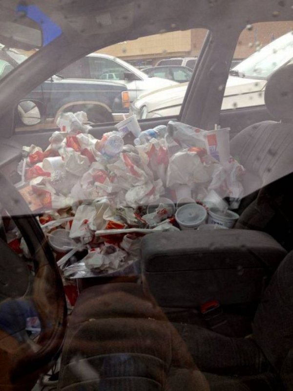 that escalated fast food wrappers in car