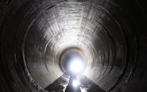 “Walked about 3km into a storm drain once, and all of a sudden we saw a pair of glowing eyes staring at us in the distance. Then it made a noise, which was distorted by the acoustics of the drain and made us freak the fuck out. It was like a horror movie, we were very deep into the drain, and it was pitch black. We had no idea what it was and why it was down there. Anyway, I decided to approach it with caution, and it happened to be a small little white fluffball. A cat. It was soaking wet, skinny (probably hadn’t eaten for days), and was shivering. I wrapped it up in a jumper, and exited via a manhole.
This manhole opened onto someone’s driveway, directly opposite a local football match. A handful of people in the audience noticed us, 2 random teenagers popping out of a manhole with a soggy cat. The facial expressions of the police officers were priceless when we had to explain why we were trying to take a cat with us onto public transport.”