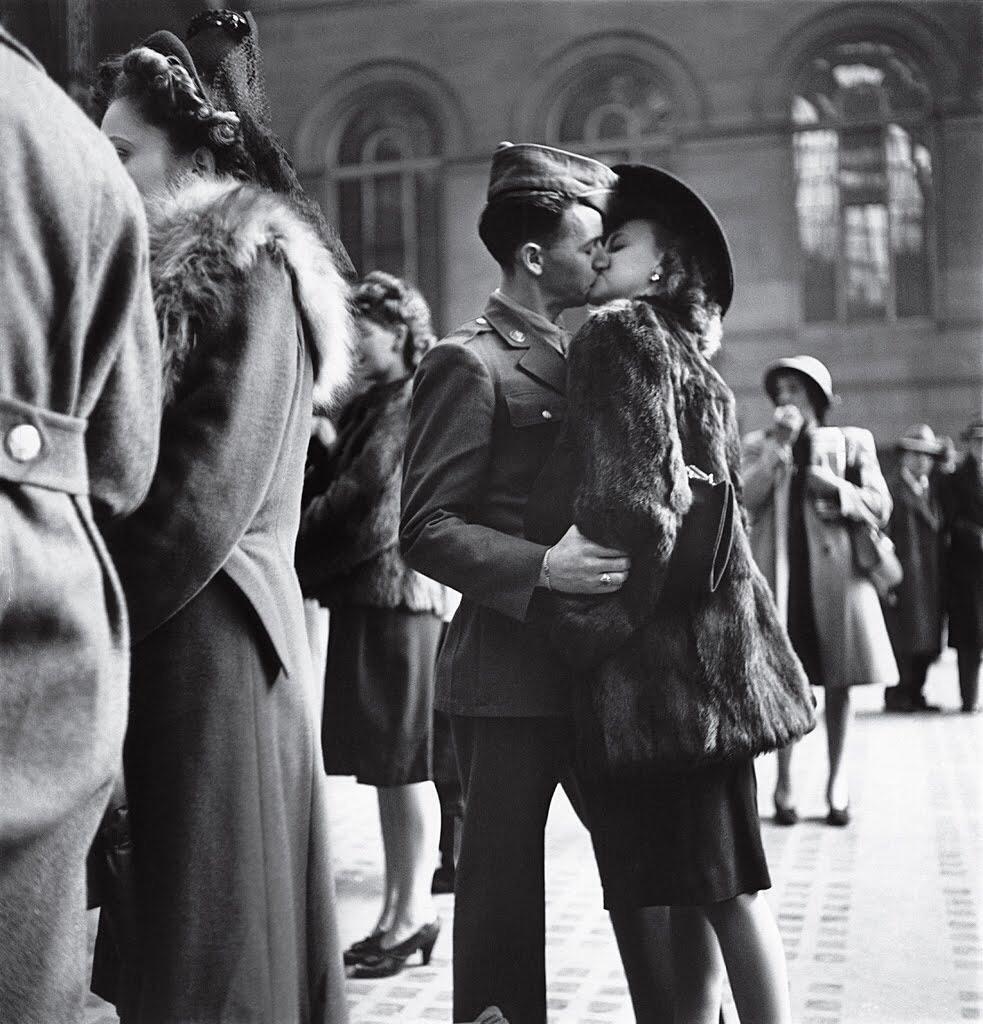 At New York’s Penn Station in 1944, a private moment repeated in public millions of times over the course of the war: a guy, a girl, a goodbye – and no assurance that he’ll make it back.