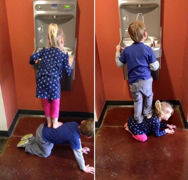Kids using teamwork to get some water.