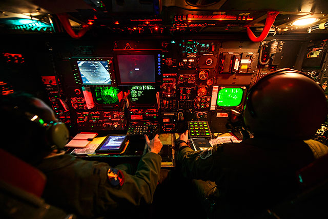 Air Force Capts. Zachary Proano, left, and Andrew Parlsen conduct a training mission on a B-52H Stratofortress aircraft over Nevada